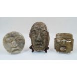 Three pre-Colombian style alabaster and hardstone face masks, 20th century, one with pierced eyes