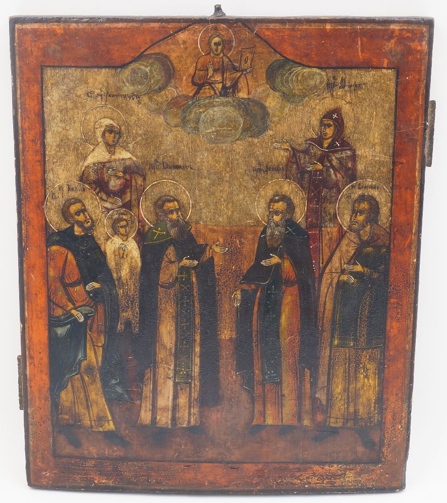 Two Russian icons, early 20th century, one depicting Christ ascended in clouds with a host of