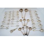 A collection of silver plate, comprising: twelve dessert spoons; twelve soup spoons and nine dessert