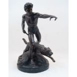 A large spelter figure of a hunter and his dog, 20th century, the hunter in a loincloth, his left