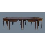 A George III and later mahogany D-end dining table, raised on tapered legs and spade feet, 74cm