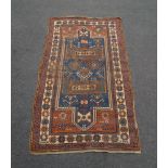 Three Caucasian rugs, extensive wear and moth damage (3) Provenance: the Estate of the late designer