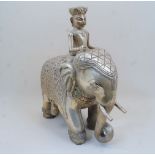 A large Indian white metal sheet covered model of an elephant and mahout, 20th century, the mahout