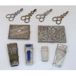 A group of silver and white metal, comprising: a silver etui, hallmarked London, date marks