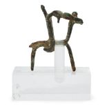 A miniature West African bronze sculpture depicting a rider on horseback, 20th century, mounted to