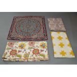 A group of quilts and spreads, late 19th / 20th centuries, decorated with geometric and floral