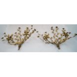 A pair of gilt-metal twin-light wall appliques, mid 20th century, each with leafy branches and