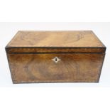A George III figured walnut and ebony strung tea caddy, the lid and body with fruitwood parquetry