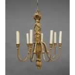 A gilt painted composite eight branch ceiling light, 76cm high It is the buyer's responsibility to