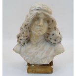 An Italian alabaster bust of a young lady, late 19th/early 20th century, depicted with flowing hair,