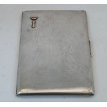 An engine-turned cigarette case, the interior stamped 925, makers mark EB, and with presentation