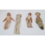 Three small bisque headed dolls, with one on straight limbed body with original sailor girl’s