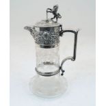 A Victorian etched glass claret jug, with silver plated mounts and lion and shield finial, 28.5cm