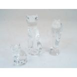 Three Steuben glass cats, 20th century, comprising two modelled seated and one on two legs, the