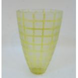 A large contemporary studio glass vase, in yellow glass with all over acid etched geometric