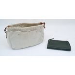 Hermes: a Fourbi 25 natural canvas and brown leather drawstring pouch bag, with Hermes label to