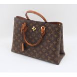 Louis Vuitton: a monogram leather Flower Tote bag, bearing date code AH1129 for March 2019, with