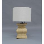 A large contemporary table lamp, circa 2010, carved from a solid block of wood, with cylindrical