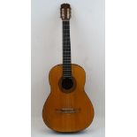 A Spanish acoustic guitar, by Anselmo Solar Gonzalez, Madrid, circa 1960s/70s, 99cm high, in