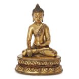 Property of a Gentleman (Lots 55-80) A Sino-Tibetan gilt bronze figure of Shakyamuni Buddha, 17th/