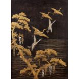 A Japanese black lacquer 'cranes' panel, Meiji period, inlaid with mother of pearl and gilt