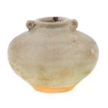 A Thai Sawankhalok squat jar, 15th/16th century, of compressed globular form, tapering at