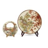A Japanese Satsuma porcelain flower basket and plate, Meiji period, the basket sat atop for gilt-