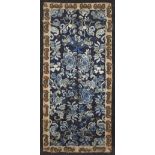 A Chinese blue ground silk embroidered panel, 19th century, the rectangular panel embroidered to the