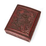 A large Japanese red lacquer rectangular box and cover, late 19th century, decorated to the cover