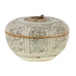 A large Thai Sawankhalok 'lime' box and cover, 15th century, the stoneware bowl painted in