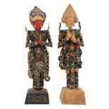A pair of Balinese Kepeng coin statues, 20th century, made of coins held together with cotton twine,