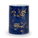 A Chinese powder-blue and gilt brushpot, Kangxi period, of cylindrical form, painted to the exterior