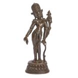 A Nepalese bronze figure of Padmapani, 18th/19th century, cast standing atop a double lotus base,