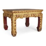 A Thai carved giltwood small table, 19th century, carved to the sides and legs with flowering