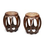 A pair of Chinese mother of pearl inlaid wood barrel stools, late Qing dynasty, the top with a