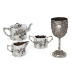 A Chinese three piece silver tea set a goblet, the goblet by Luen Wo, 19th century, the tea set