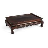 A Chinese rosewood rectangular table top stand, 20th century, with cabriole legs and openwork