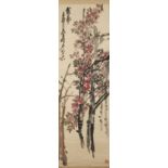 After Wu Changshuo (1844 - 1927), ink and colour on paper, hanging scroll, depicting leafy flower