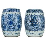 A pair of Chinese blue and white garden stools, late 19th century, each in the shape of a barrel,