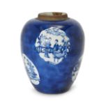 A large Chinese powder blue jar, Kangxi period, painted in underglaze blue with cartouches of