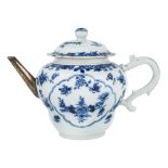 A Chinese blue and white teapot and cover, 18th century, painted to the front and back with panels