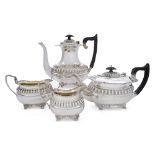 An Edwardian silver four-piece tea set, Chester, 1906, George Nathan & Ridley Hayes, each with