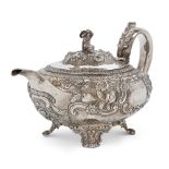 A George IV silver teapot, London, 1824, Hyam Hyams, of compressed rounded form, the body repousse