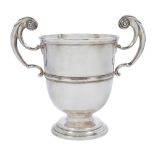 A late Victorian twin handled cup, London, 1899, Charles Stuart Harris, with bifurcated scroll