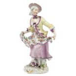 A Meissen porcelain figure of a girl dancing, c.1755, blue crossed swords mark to back of base,