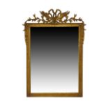 A French giltwood mirror, 18th century style, the bevelled plate beneath ribbon cresting, with label