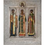 A Russian icon of the Three Hierarchs of Orthodoxy, 1908-1926, marked with 84 standard, Moscow,