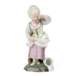 A German porcelain figure of Die verschuttete Milch (The Spilled Milk), probably Hochst, probably