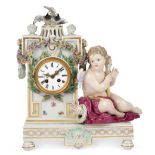 A Meissen porcelain mantel clock case, late 19th century, of architectural form, encrusted with a