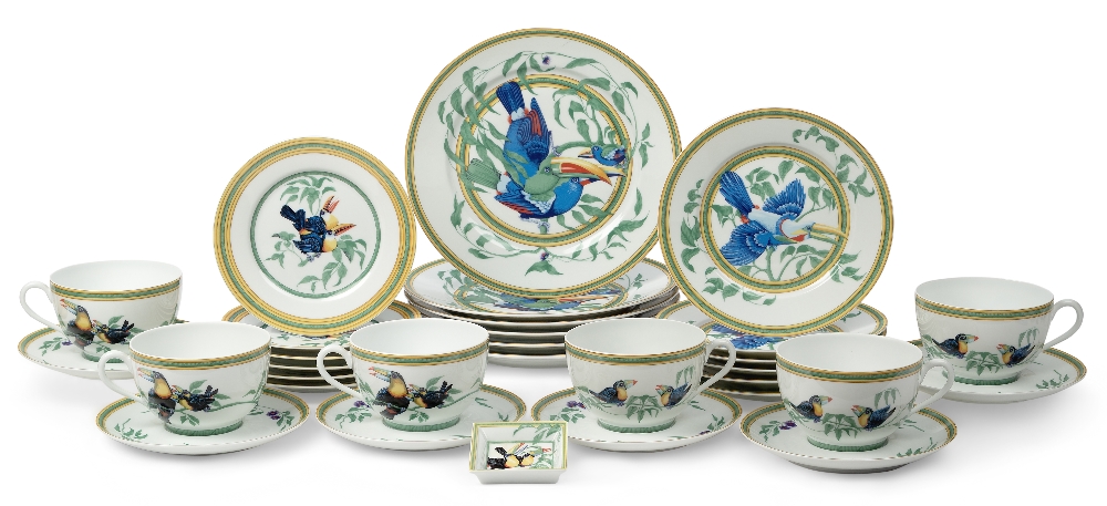 A Hermes Porcelaine 'Toucans' pattern dinnerware set, c.1980s, of cream ground with bright green and